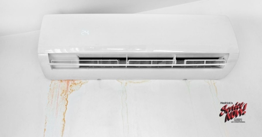 An AC unit leaking on the wall in a residential home.